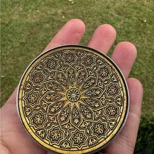 Intricate Gold and Black Decorative Plate